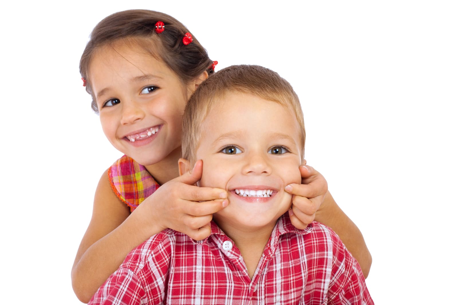 Happy, smiling children after a gentle first dental visit at DK Dental Care